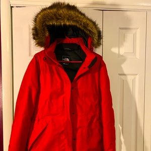 The North Face Womens knee length Goose feather lined ski jacket in red!